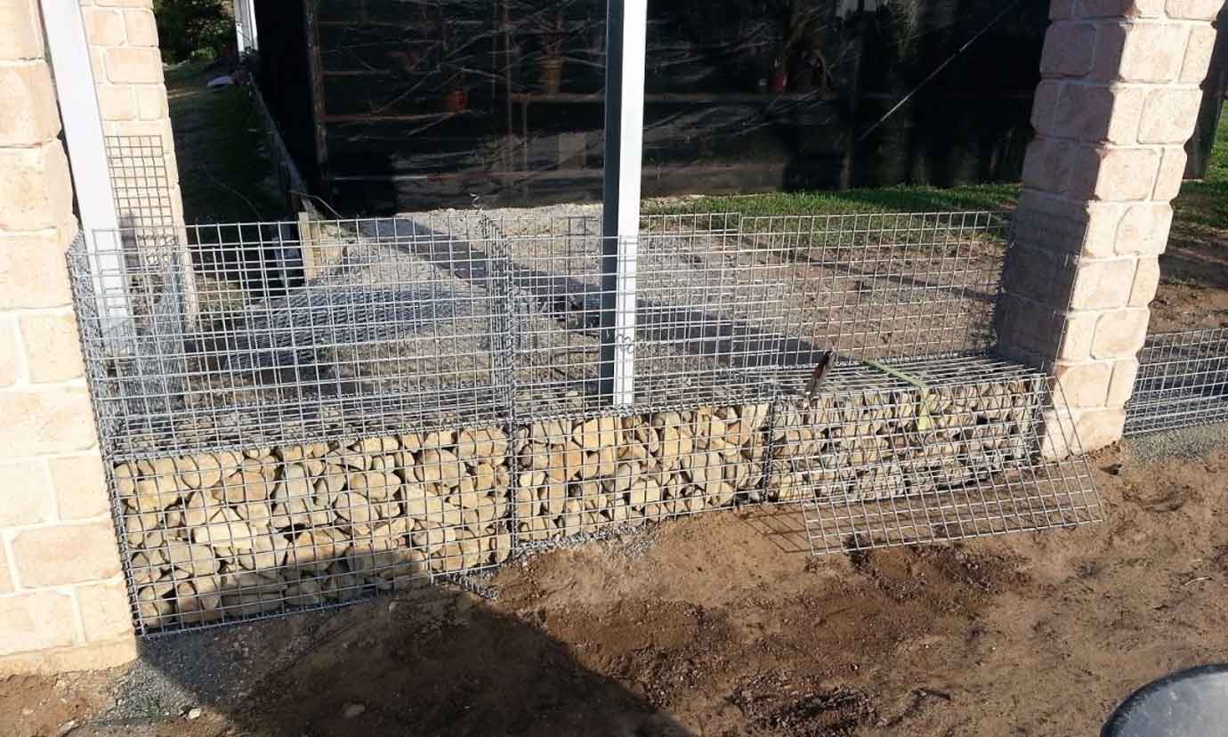 Gabion cage filled with local stone